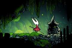 A statue containing shell shards in Hollow Knight: Silksong.